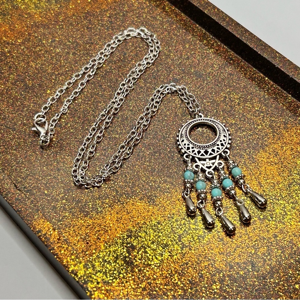 Silver Tone Dreamcatcher Necklace with Turquoise Stone Accents